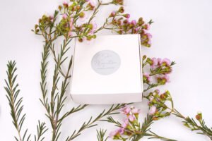 white box with silver logo